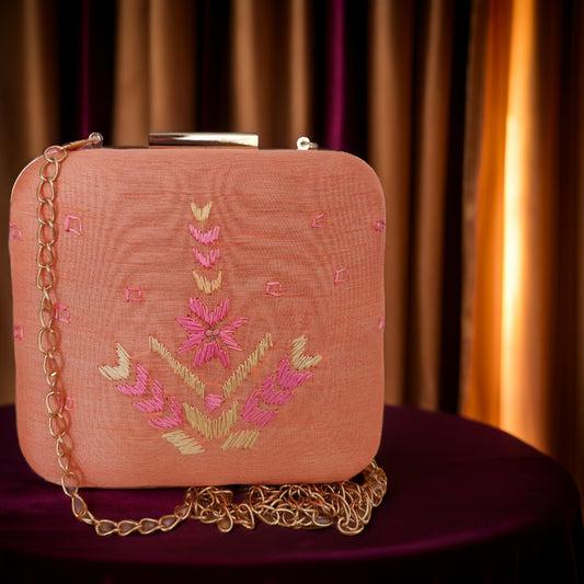 Pure Silk Hand Embroidered Phulkari Clutch - calm peach pink + Artisanal + Punjab + Tradition + Women + MakeInIndia + Handicraft + Motif + trend + festival wear + comfort wear + smart wear + trendy wear + indian ethnic + cultural wear + rakhi + diwali + ganesh cahturthi + friends wear + date wear + casual wear + indian wear + western wear + trendy attire + fashion + stylish + dinner + clutch + handbag + sling bag + classy + marriage essentials + bride wear
