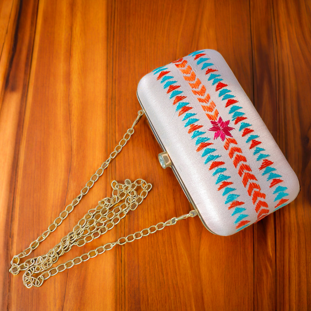 Pure Silk Hand Embroidered Phulkari Clutch - powder pink peach + Artisanal + Punjab + Tradition + Women + MakeInIndia + Handicraft +  trend + festival wear + comfort wear + smart wear + trendy wear + indian ethnic + cultural wear + rakhi + diwali + friends wear + date wear + casual wear + indian wear + western wear + trendy attire + fashion + stylish + dinner + clutch + handbag + sling bag + classy + marriage essentials + bride wear + punjab + panjab + handwork + vibrant + signature + trendy + luxury + best