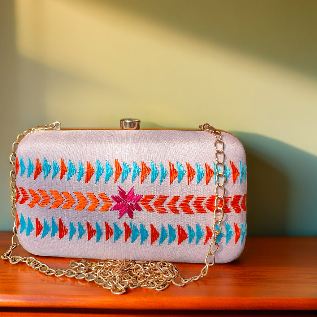 Pure Silk Hand Embroidered Phulkari Clutch - powder pink peach + Artisanal + Punjab + Tradition + Women + MakeInIndia + Handicraft +  trend + festival wear + comfort wear + smart wear + trendy wear + indian ethnic + cultural wear + rakhi + diwali + friends wear + date wear + casual wear + indian wear + western wear + trendy attire + fashion + stylish + dinner + clutch + handbag + sling bag + classy + marriage essentials + bride wear + punjab + panjab + handwork + vibrant + signature + trendy + luxury + best