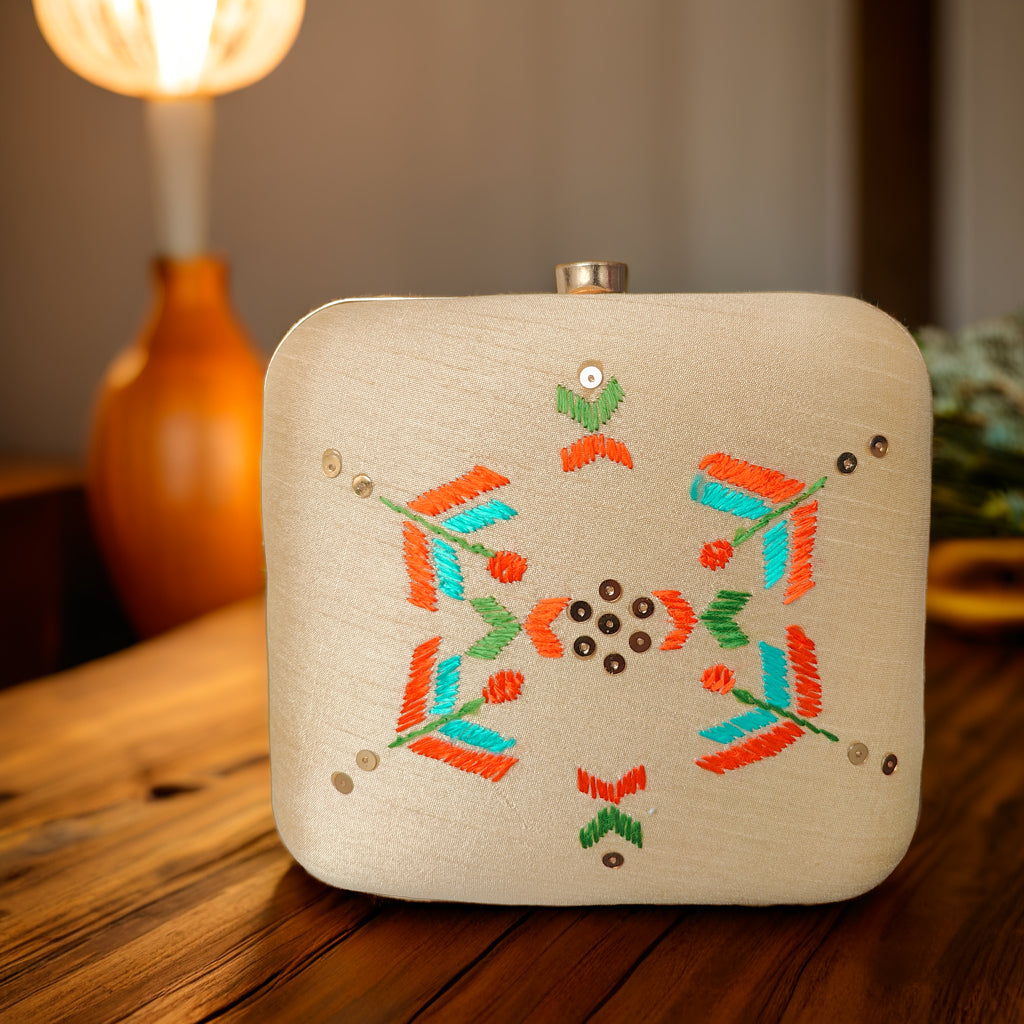 Pure Silk Hand Embroidered Phulkari Clutch - radiant gold beige+ Artisanal + Punjab + Tradition + Women + MakeInIndia + Handicraft +  trend + festival wear + comfort wear + smart wear + trendy wear + indian ethnic + cultural wear + rakhi + diwali + friends wear + date wear + casual wear + indian wear + western wear + trendy attire + fashion + stylish + dinner + clutch + handbag + sling bag + classy + marriage essentials + bride wear + punjab + panjab + handwork + vibrant + signature + trendy + luxury + best