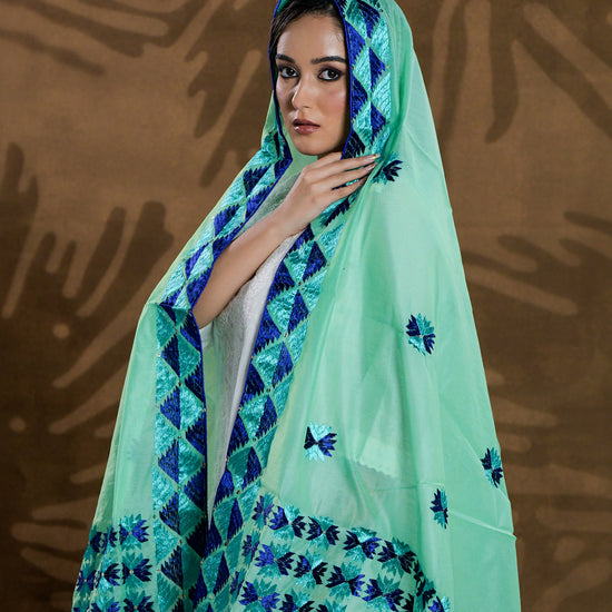 Pure Chanderi Silk Hand Embroidered Phulkari Dupatta - Green Blue +  multicolor + royal + antique + Artisanal + Punjab + Tradition + Women + MakeInIndia + Handicraft + Panjab + Rang + Colours + Girl Clothing + Fulkari + Threads + Colours + Colors + Embroidery + Handwork + Artisan + Stylish + Royalty + Royal + Decoration + Decor+ Heritage Punjab + NRI + shagan + sangeet + wedding + vyah + engagement + party + best + top + premium + import + export + shahi + gift + unique + light + heavy + rural + patiala