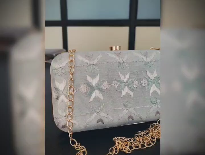 Pure Silk Hand Embroidered Phulkari Clutch - gracious silver + Artisanal + Punjab + Tradition + Women + MakeInIndia + Handicraft +  trend + festival wear + comfort wear + smart wear + trendy wear + indian ethnic + cultural wear + rakhi + diwali + ganesh cahturthi + friends wear + date wear + casual wear + indian wear + western wear + trendy attire + fashion + stylish + dinner + clutch + handbag + sling bag + classy + marriage essentials + bride wear + punjab + panjab + handwork + vibrant + signature